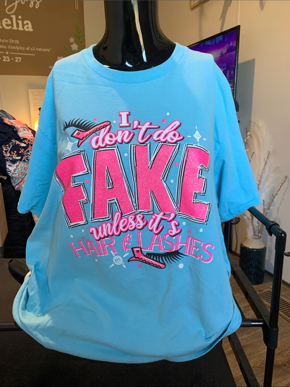 #98 Light Blue Short Sleeve Graphic Tee with Pink 'I don’t do FAKE' Text